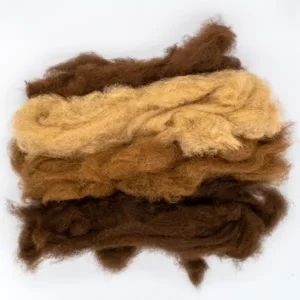 four different brown colour carded alpaca fibre